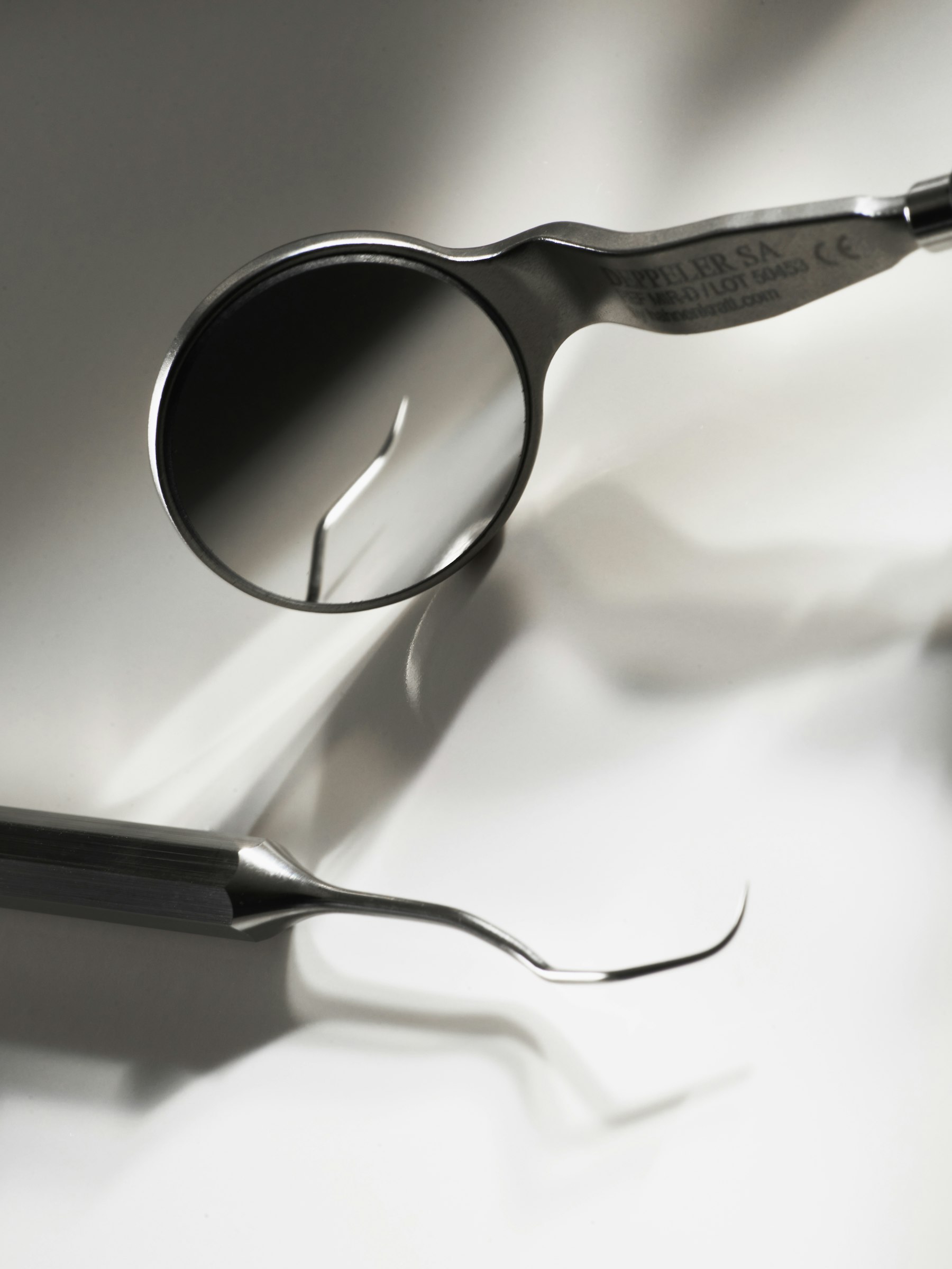 A dental mirror and probe